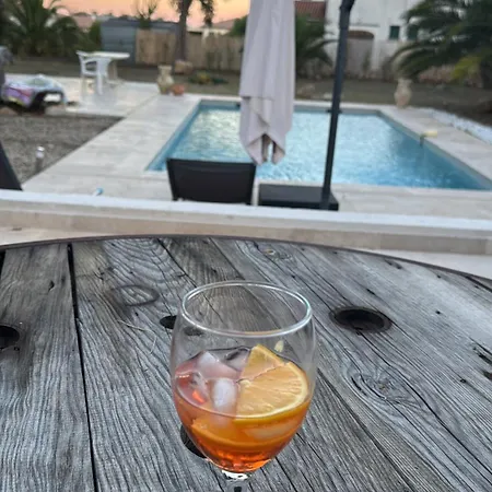 Maison De